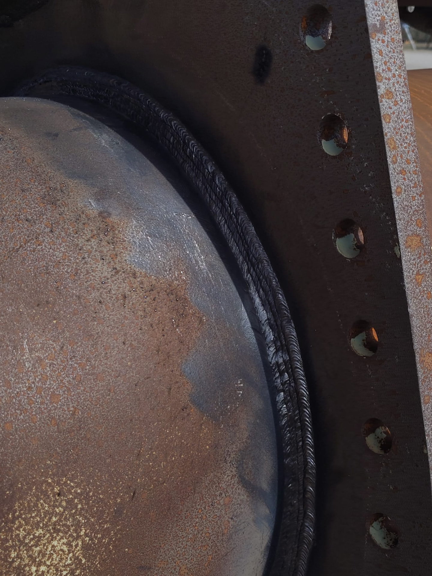 Detail of a finished pipe-to-flange weld joint
